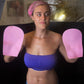 Glo'guard hands on client during spray tan